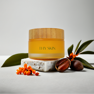 Jar of 'THY SKIN' cream with natural elements on a light background
